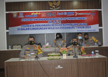 Kapolresta Pekanbaru Tandatangani MoU dengan Bank BUMN-BUMD se-Kota Pekanbaru.